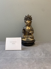 A Chinese parcel-gilt bronze Guanyin, Ming