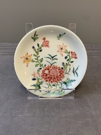 Three Chinese famille rose 'birds and flowers' cups and saucers, Yongzheng