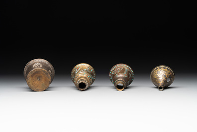 A bidri vase, a steel hookah cup and three copper alloy hookah mounts, India/Persia, 19th C.