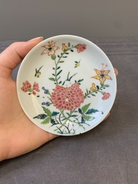 Three Chinese famille rose 'birds and flowers' cups and saucers, Yongzheng