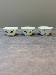 Three Chinese famille rose 'birds and flowers' cups and saucers, Yongzheng