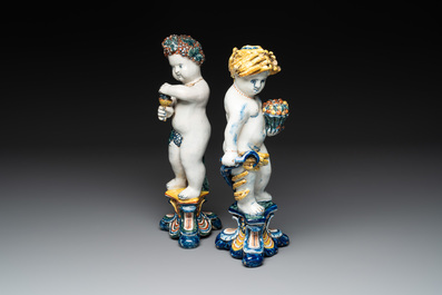 Two polychrome Dutch Delft allegorical figures of the four seasons, 18th C.
