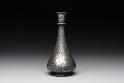 A bidri vase, a steel hookah cup and three copper alloy hookah mounts, India/Persia, 19th C.