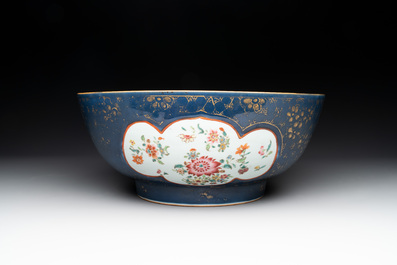 A large Chinese famille rose blue-ground punch bowl and dish, Qianlong