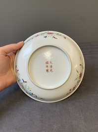 A Chinese iron-red-decorated famille rose 'dragon' plate, Guangxu mark, 19/20th C.