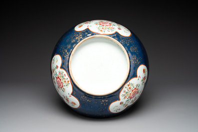 A large Chinese famille rose blue-ground punch bowl and dish, Qianlong