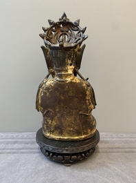 A Chinese parcel-gilt bronze Guanyin, Ming