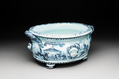 A blue and white Dutch Delft chinoiserie jardini&egrave;re with mascarons, late 17th C.