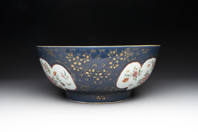 A large Chinese famille rose blue-ground punch bowl and dish, Qianlong