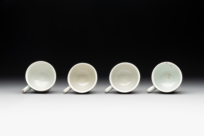 Two Chinese famille rose 'rooster' teapots, a milk jug and four handled cups, Yongzheng