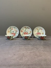Three Chinese famille rose 'birds and flowers' cups and saucers, Yongzheng