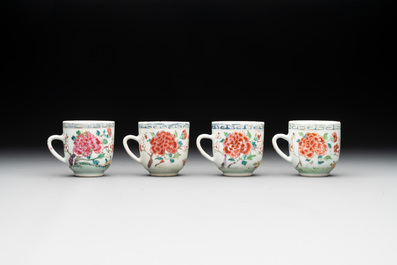 Two Chinese famille rose 'rooster' teapots, a milk jug and four handled cups, Yongzheng