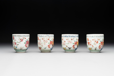 Two Chinese famille rose 'rooster' teapots, a milk jug and four handled cups, Yongzheng