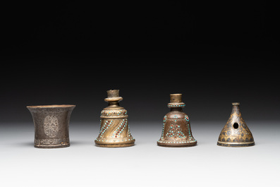 A bidri vase, a steel hookah cup and three copper alloy hookah mounts, India/Persia, 19th C.