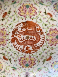 A Chinese iron-red-decorated famille rose 'dragon' plate, Guangxu mark, 19/20th C.