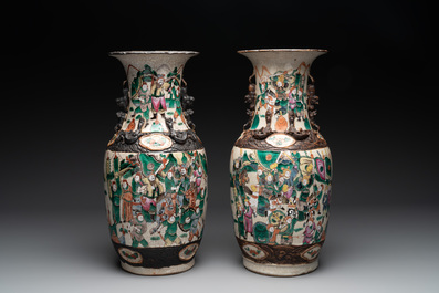 Seven Chinese Nanking blue and white and famille verte crackle-glazed vases, 19/20th C.
