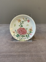 Three Chinese famille rose 'birds and flowers' cups and saucers, Yongzheng