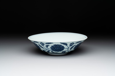 A Chinese blue and white 'flower scroll' bowl, Qianlong mark, 20th C.