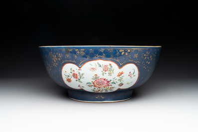 A large Chinese famille rose blue-ground punch bowl and dish, Qianlong