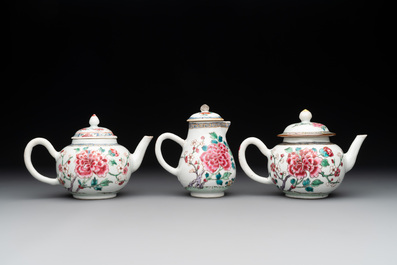 Two Chinese famille rose 'rooster' teapots, a milk jug and four handled cups, Yongzheng