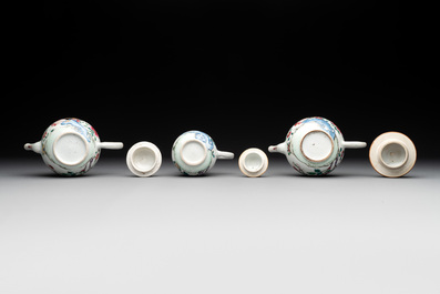 Two Chinese famille rose 'rooster' teapots, a milk jug and four handled cups, Yongzheng