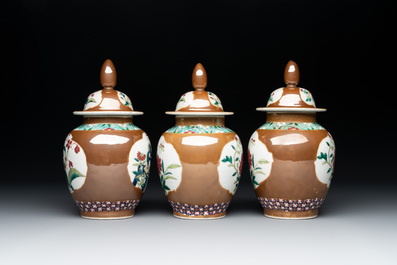 Three Chinese famille rose capucin-brown-ground vases and three covered sugar bowls, 18/19th C.