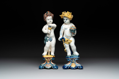 Two polychrome Dutch Delft allegorical figures of the four seasons, 18th C.