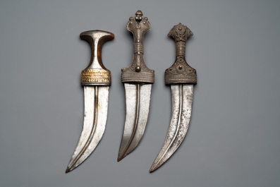 Three Omani Khanjars, one with Rhinoceros horn hilt, 19th C.