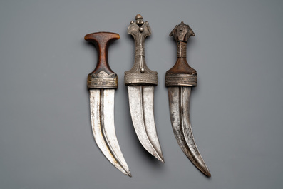 Three Omani Khanjars, one with Rhinoceros horn hilt, 19th C.