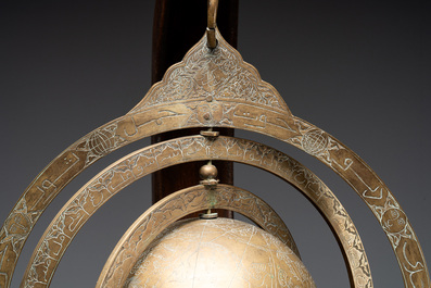 An Islamic brass astrolabe and a Persian sundial with compass, 19th C.