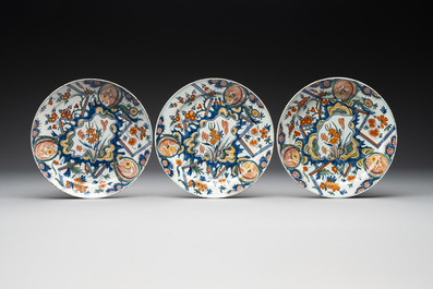 Three polychrome Dutch Delft 'lightning' plates and one dish, 1st quarter 18th C.