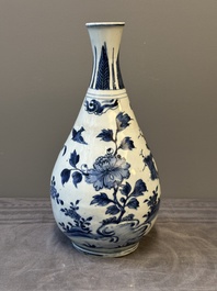 A Chinese blue and white 'birds among flowering branches' bottle vase, Ming