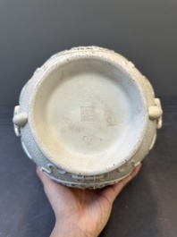 A Chinese white-glazed biscuit 'hu' vase with dragons, Qianlong mark, 19/20th C.