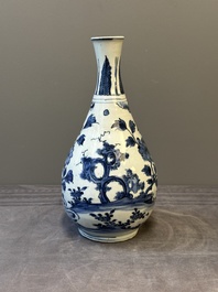 A Chinese blue and white 'birds among flowering branches' bottle vase, Ming