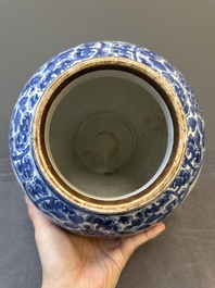 A Chinese blue and white 'antiquities and peony scrolls' vase and cover, Kangxi