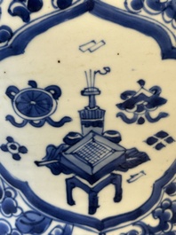 A Chinese blue and white 'antiquities and peony scrolls' vase and cover, Kangxi