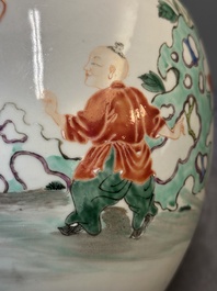 A Chinese famille rose 'ladies and boys' jar with wooden cover and stand, Yongzheng/Qianlong