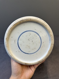 A Chinese blue and white 'antiquities and peony scrolls' vase and cover, Kangxi