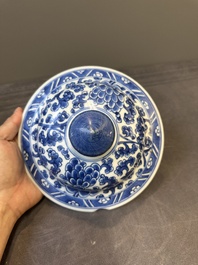 A Chinese blue and white 'antiquities and peony scrolls' vase and cover, Kangxi