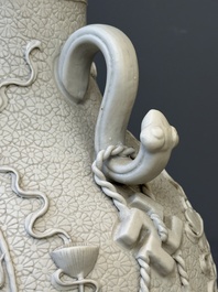 A Chinese white-glazed biscuit 'hu' vase with dragons, Qianlong mark, 19/20th C.