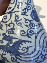 A Chinese blue and white 'phoenix and flower scroll' bottle vase, Ming