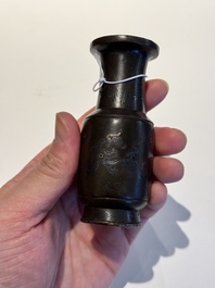 A small Chinese gold- and silver-inlaid bronze 'chilong' vase, late Ming
