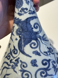 A Chinese blue and white 'phoenix and flower scroll' bottle vase, Ming