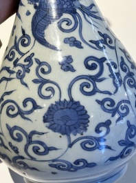 A Chinese blue and white 'phoenix and flower scroll' bottle vase, Ming