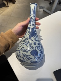 A Chinese blue and white 'phoenix and flower scroll' bottle vase, Ming