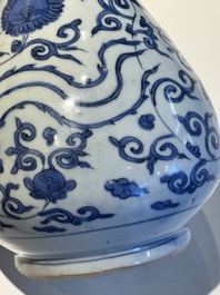 A Chinese blue and white 'phoenix and flower scroll' bottle vase, Ming