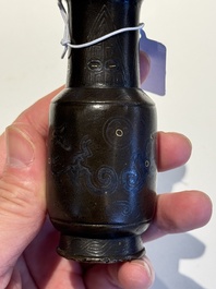 A small Chinese gold- and silver-inlaid bronze 'chilong' vase, late Ming