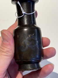 A small Chinese gold- and silver-inlaid bronze 'chilong' vase, late Ming