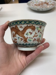 Two famille rose 'dragon' bowls and covers and a plate, Qianlong and Guangxu marks, 19/20th C.