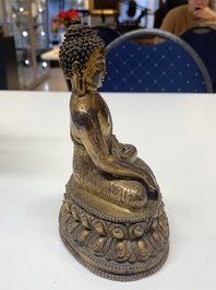 A fine Sino-Tibetan gilt bronze Buddha, 15/16th C.